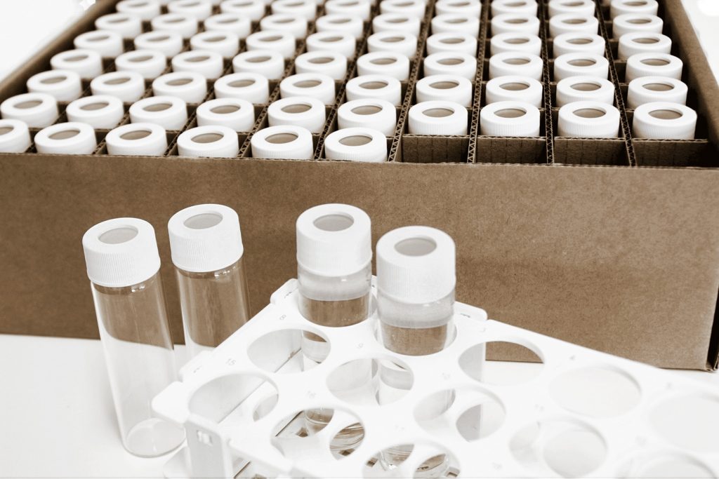 Altus Science Natura 100 certified clean vials being packed into boxes